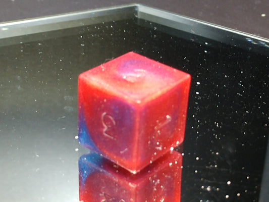 red swirl d6